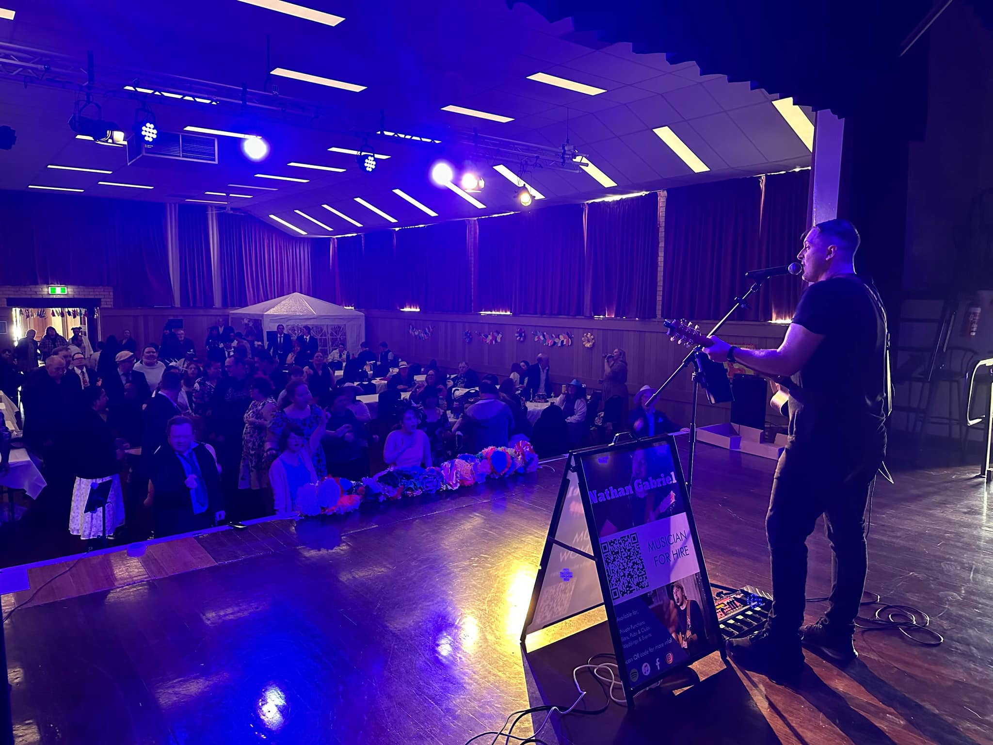 Nathan Gabriel performing at a community event